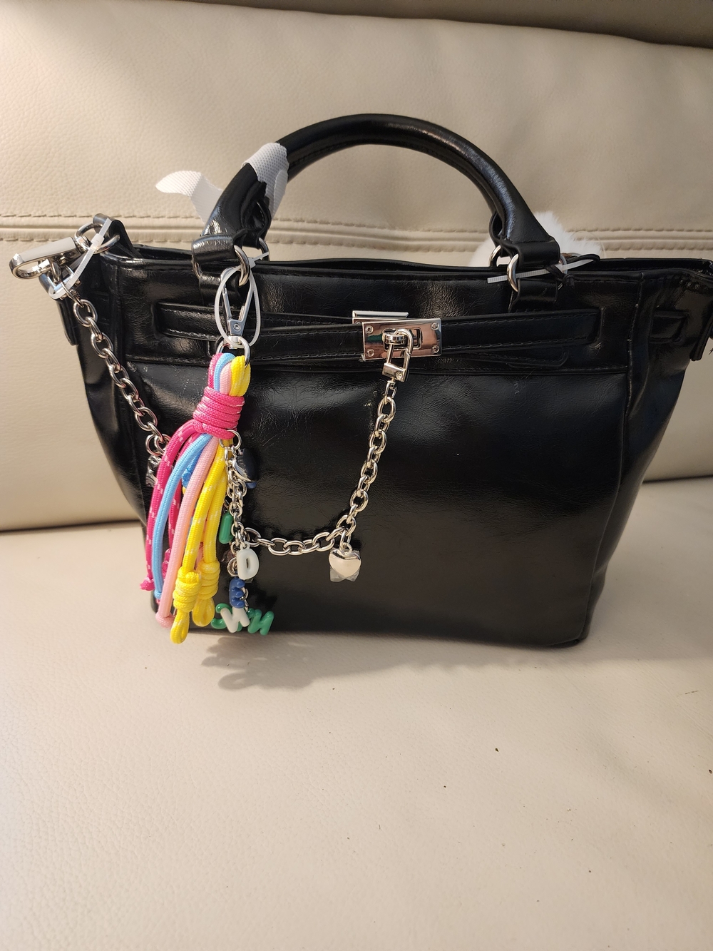 Black Leather Shoulder Bag with Silver Chain and Multicolor Tassel
